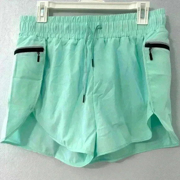 117. Oalka Women's Quick Dry Running Shorts Lined Workout Shorts with Pocket - Picture 2 of 6